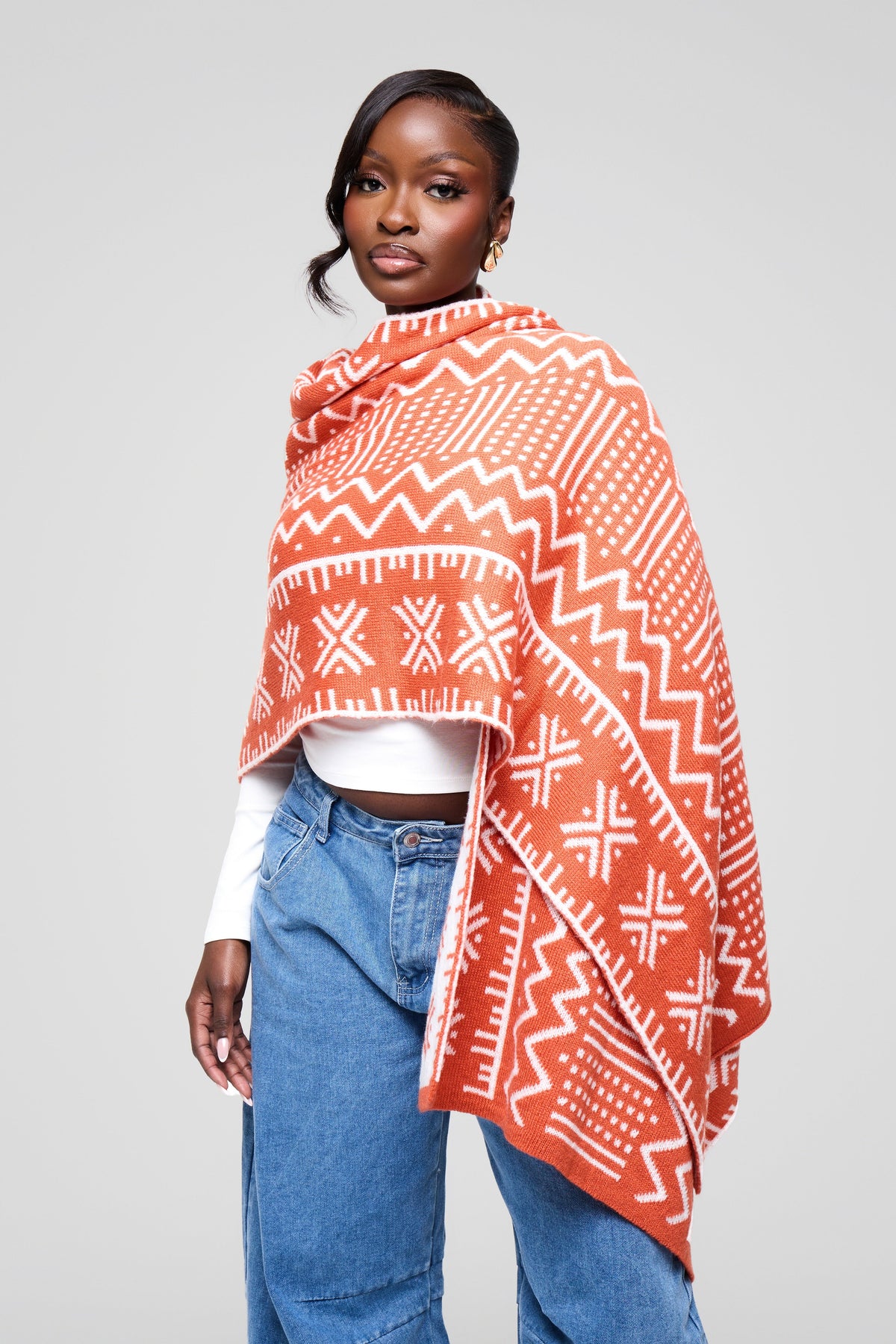 Model wearing the Mbongo Flames knitted scarf